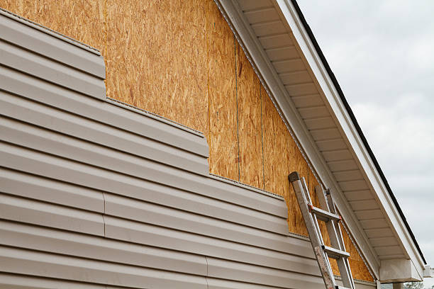 Professional Storm Damage Siding Repair technician working in Annapolis Junction, MD